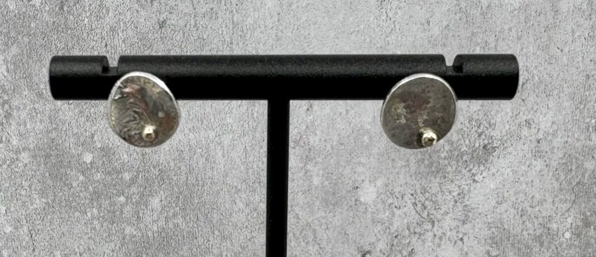 recycled silver stud earrings with unique texture and gold pebble detail