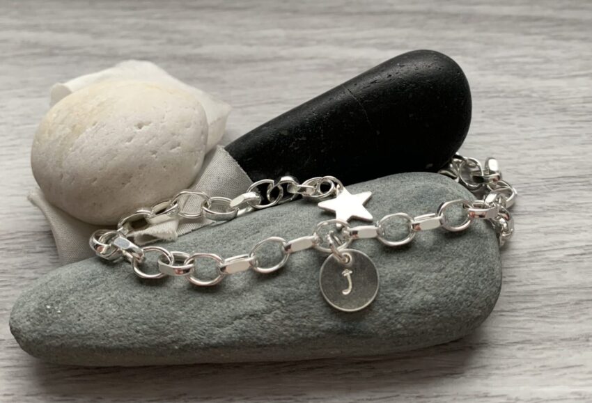 a bespoke silver chain charm bracelet