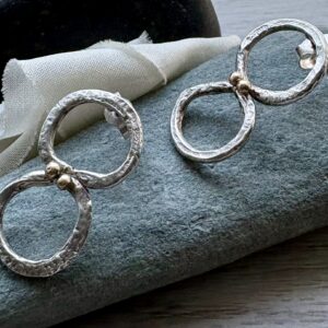 recycled silver and gold detail infinity stud drop earrings. Unique organic shape and textures.